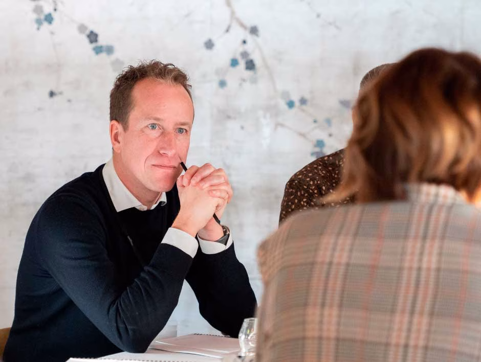 Participants in conversation during NLP consultant training program